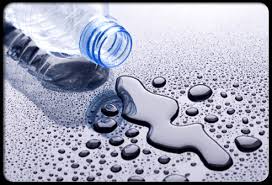 plastic bottle of water on the floor